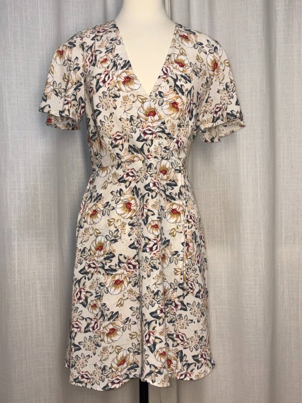 Floral Mini "Wrap" dress with draped sleeve